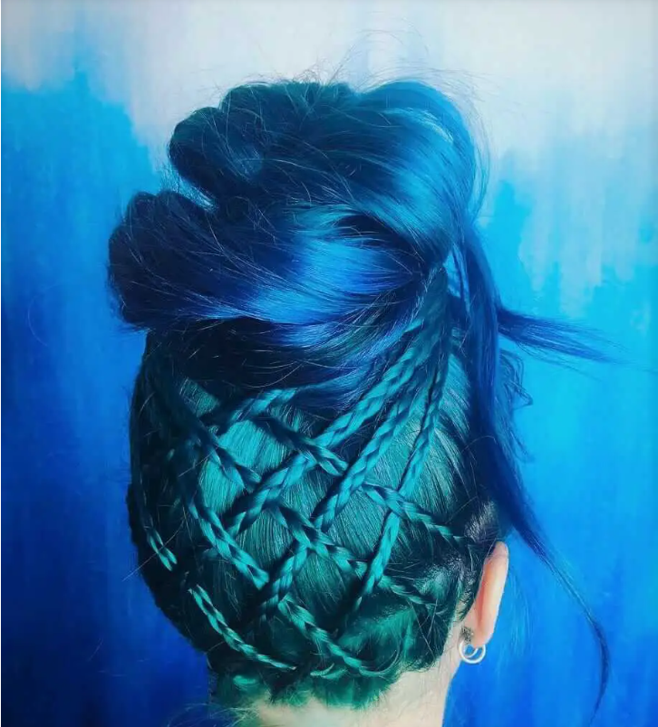 Blue and turquoise dyed hair with high bun