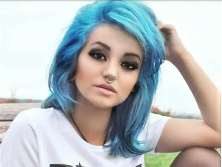 Scene hairstyle with turquoise-ish dye